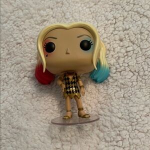 Harley Quinn Funko Figure with Red, Blue, and Gold Accents